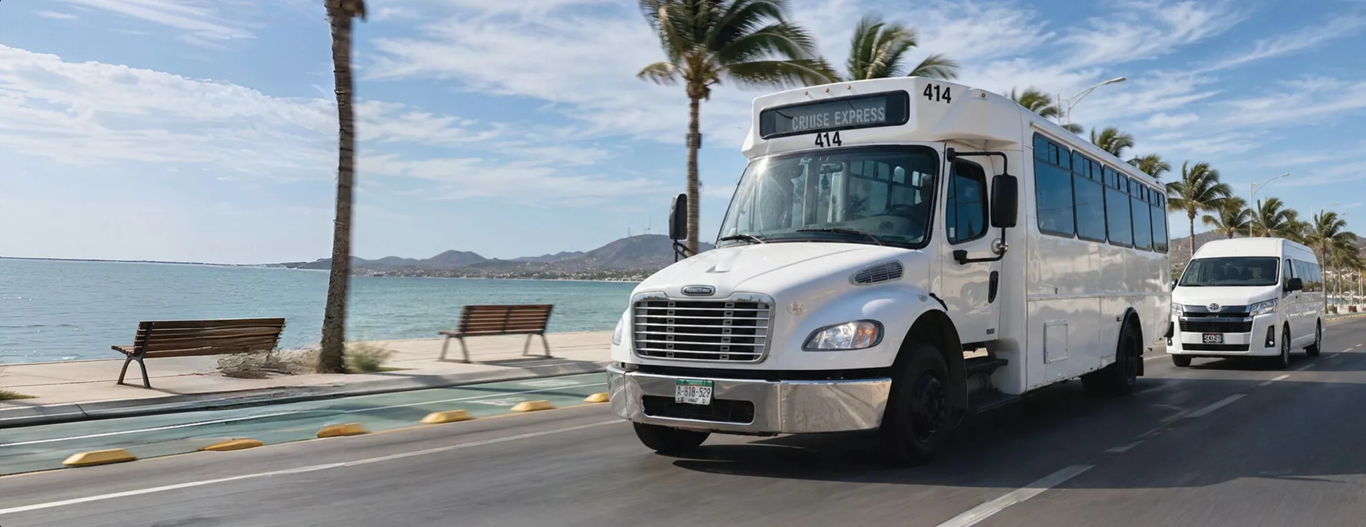 Autobús y camioneta de ATP circulando por el malecón